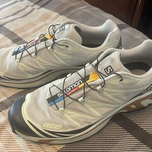 Salomon tennis shoes. Navy and light gray